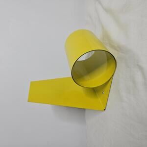 Vintage Bookend Coiled Steel Bookworm MCM Yellow Enameled Modernist